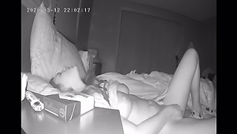 A Reserved Woman Pleasures Herself With Her Fingers Before Sleep, Captured By A Hidden Camera